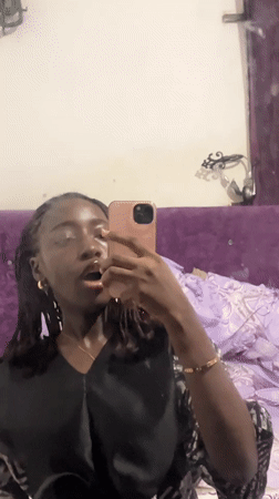 Woman records morning selfies in Abuja bedroom