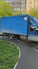 Blue van has tire trouble on Yekaterinburg street