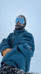 Snowboarder hits slopes in Kutchan, Japan winter conditions