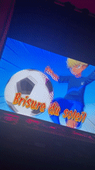 Late-night anime viewing captured on TV screen in Massy