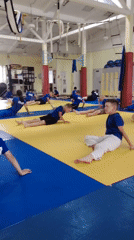 Martial arts training session in Chaikovsky gymnasium