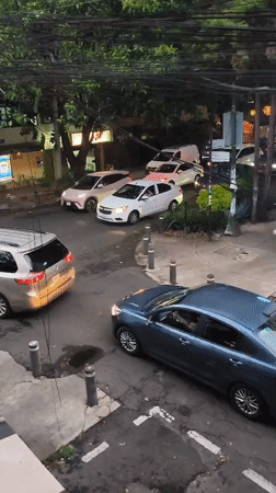 Street scene documented in overcast Mexico City evening