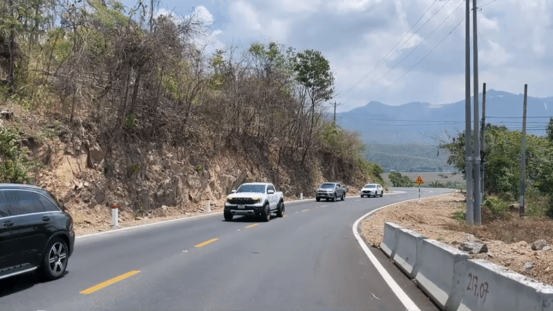 Morning traffic flows through mountain roads in rural Vietnam