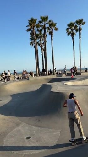 Early morning skateboarding and running activity at Venice Beach