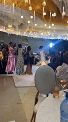 Wedding reception celebration documented in decorated Dar es Salaam hall