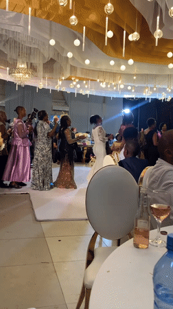 Wedding reception celebration documented in decorated Dar es Salaam hall