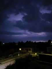 Late-night storm rolls through Tczew, rain and lightning over quiet streets