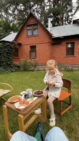 Backyard snack spread and morning treats in a Russian yard