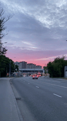 Urban neighborhood at dusk, streets and skies at golden hour