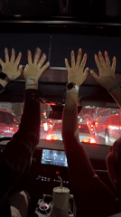 Night traffic stop captured with passengers celebrating in Puebla