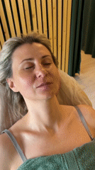 Woman rests peacefully on bed in Nizhnevartovsk