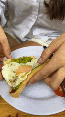 Woman enjoys breakfast in Bắc Nha Trang, Vietnam