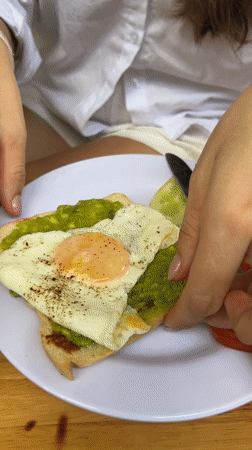 Woman enjoys breakfast in Bắc Nha Trang, Vietnam