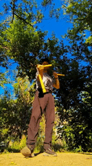 Yellow nunchucks in a Karaganda park on a clear day