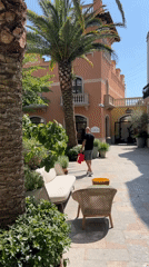 Shoppers browse luxury outlets at La Roca Village Spain