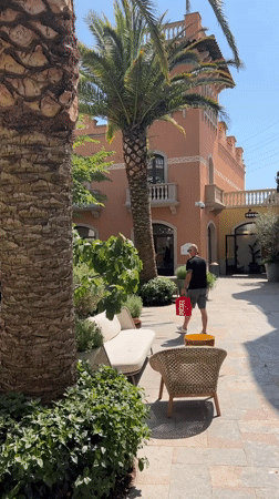 Shoppers browse luxury outlets at La Roca Village Spain