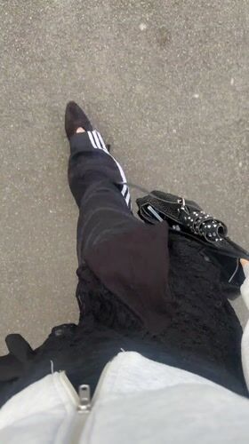 Woman photographed walking through Kent towns in distinctive outfit