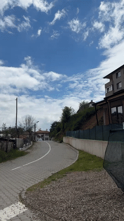 Sunday morning in Zlatograd: residential streets and sleeping orange cat