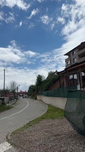 Sunday morning in Zlatograd: residential streets and sleeping orange cat