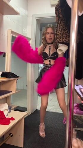 Women dancing and taking selfies indoors in Kazan
