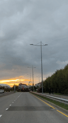 Sunset viewed over roadway in Sochi, Russia