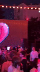 Outdoor party with LED screen, disco ball draws crowds in Moscow
