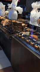 Moscow bakery display case documented with labeled goods