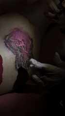Tattoo session featuring decorative designs documented in Milan parlor