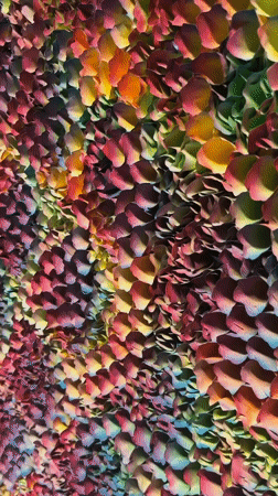 Browsing paintings, sculptures, and installations at an art gallery