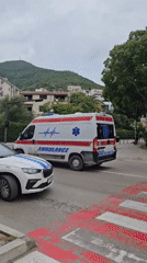 Emergency response involves vehicle and officer near public park