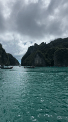 Boat traffic among Ao Nang's limestone cliffs and turquoise water