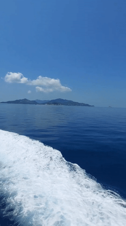 Boat travels through waters near Ko Tao, Thailand