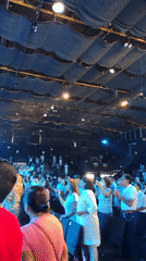 Christian worship band performs at packed auditorium in Peru