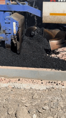 Road crews pave streets in Krasnoyarsk using Mitsubishi equipment