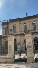 Institutional building with arched entrance documented in Córdoba