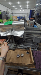 Worker handles precision components in Plovdiv warehouse