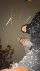 Friends gather for photos during heavy snowfall in Kraljevo