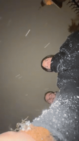 Friends gather for photos during heavy snowfall in Kraljevo