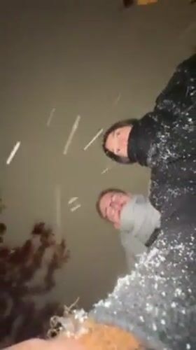 Friends gather for photos during heavy snowfall in Kraljevo