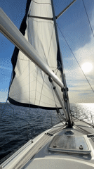 Sailing activity documented at Tolyatti marina under sunny skies