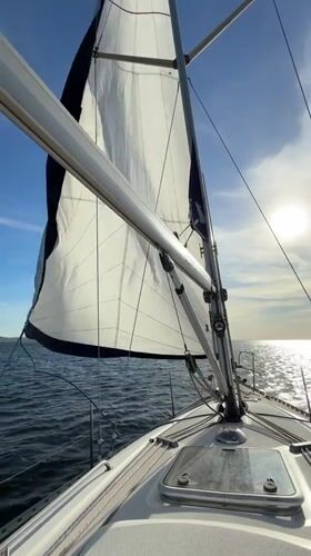 Sailing activity documented at Tolyatti marina under sunny skies