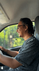 Driver spotted smiling while driving in Gerokgak, Indonesia