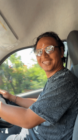 Driver spotted smiling while driving in Gerokgak, Indonesia