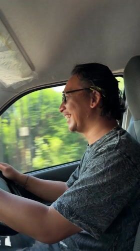 Driver spotted smiling while driving in Gerokgak, Indonesia