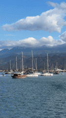 Morning calm captured at Fethiye harbor with sailboats