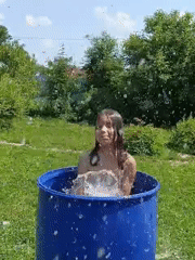 Summer backyard cooling off session captured in Lagovskoe