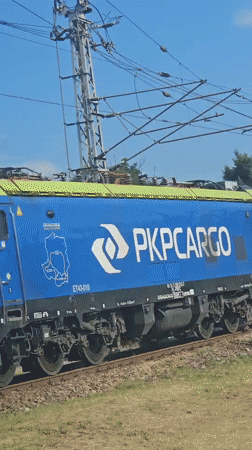 PKP Cargo locomotive and a domed building in Prešov