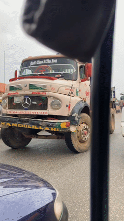 Decorated Mercedes truck spotted on Nigerian roadway