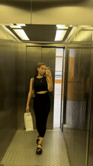 Everyday moments captured in Klin: elevator selfie, park fountain