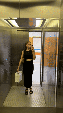 Everyday moments captured in Klin: elevator selfie, park fountain